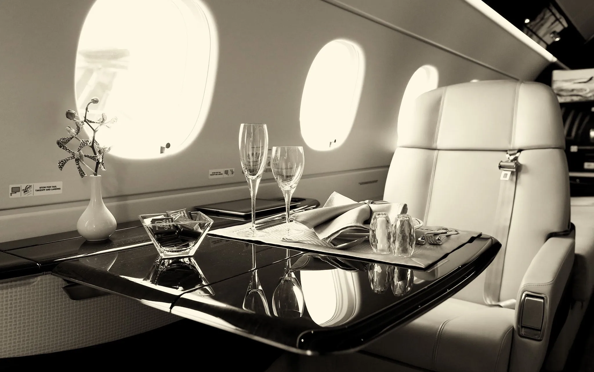 Champagne service aboard a private jet